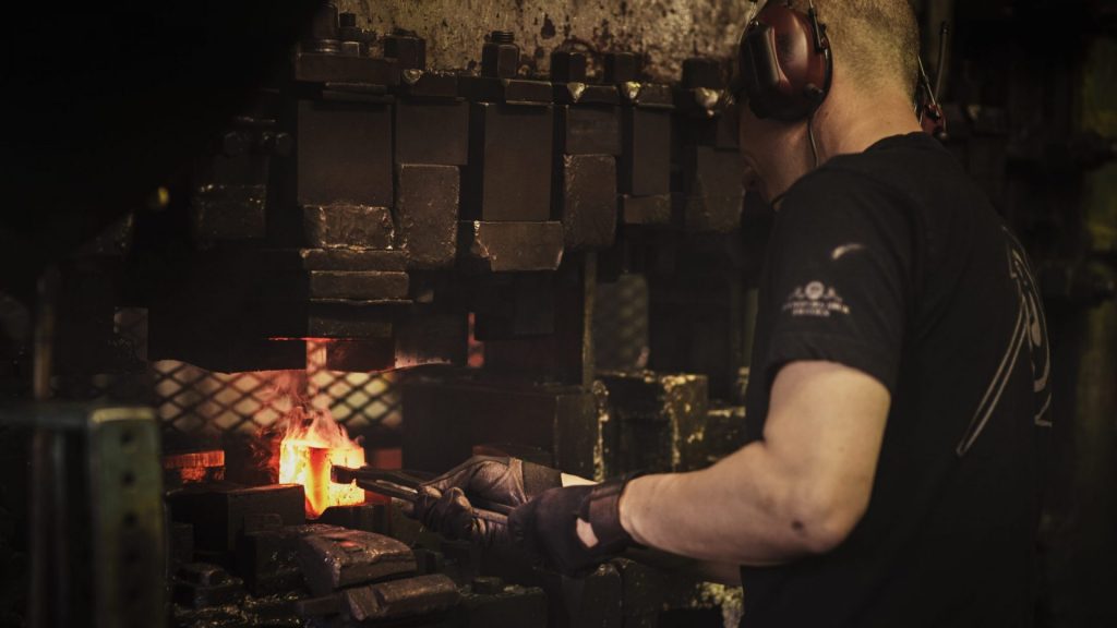 Blacksmith firing axe head